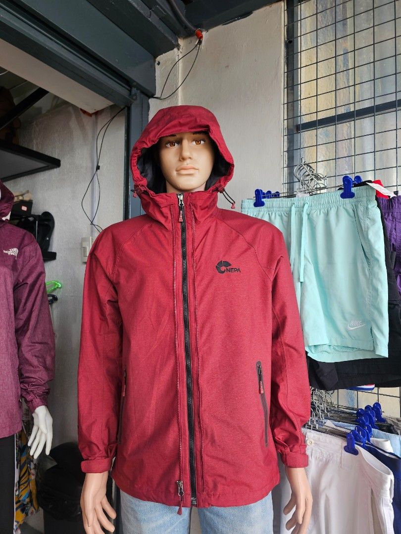 NEPA outdoor zip-up hooded jacket (Category: Coats, Jackets and Outerwear) located in Baguio. Submitted by kayeonlineshop (Listing ID 1469785209, Image 1). Description: red NEPA outdoor zip-up hooded jacket with a black interior lining and zippered chest pockets.