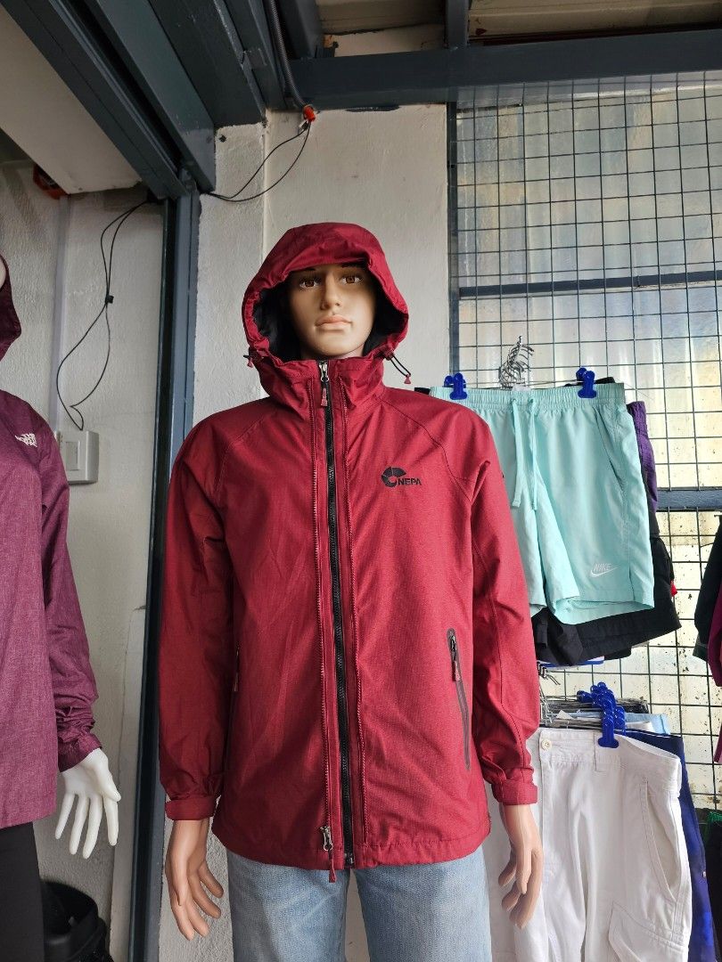 NEPA outdoor zip-up hooded jacket (Category: Coats, Jackets and Outerwear) located in Baguio. Submitted by kayeonlineshop (Listing ID 1469785209, Image 2). Description: red NEPA outdoor zip-up hooded jacket with a black interior lining and zippered chest pockets.