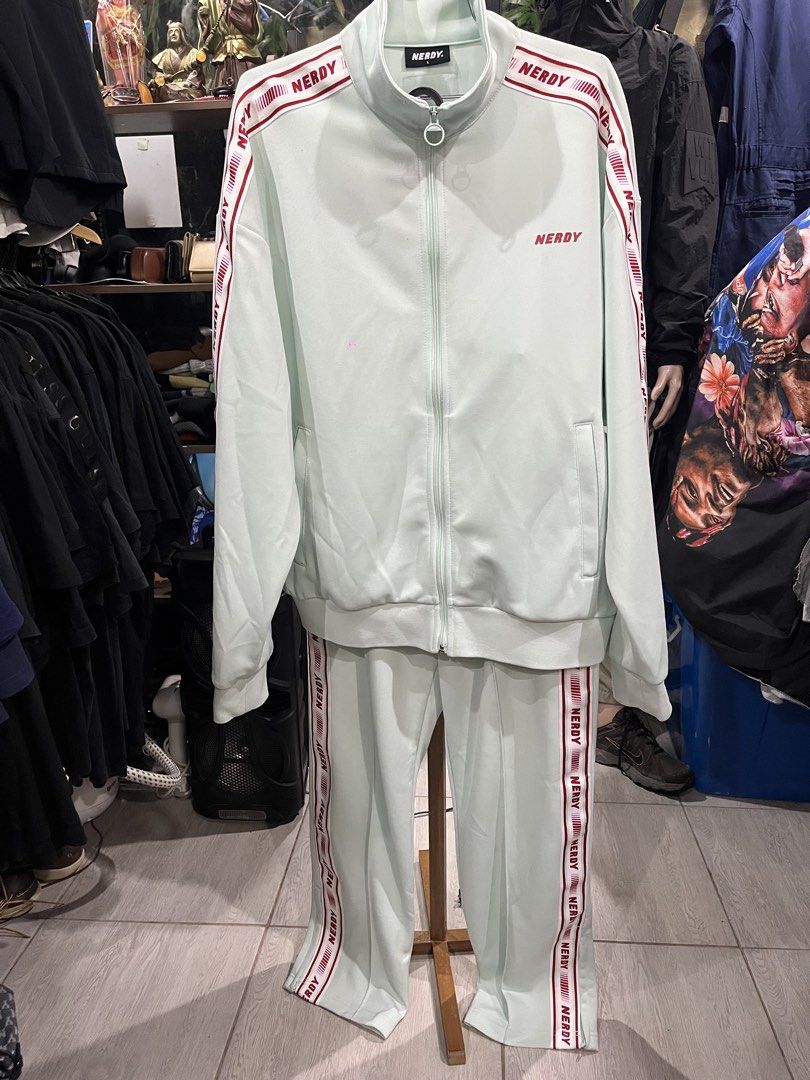 Nerdy Mint Set Track Jacket and Track Pants / Large (Category: Sets & Coordinates) located in Camalaniugan. Submitted by anarchymonopoly052128 (Listing ID 1469906957, Image 1). Description: Jacket Width: 26.5 Inches Length: 27.5 Inches Pants Length: 39 Inches Hem: 8 Inches Thigh: 12.5 Inches Waistline: Garterize 28 to 32 .