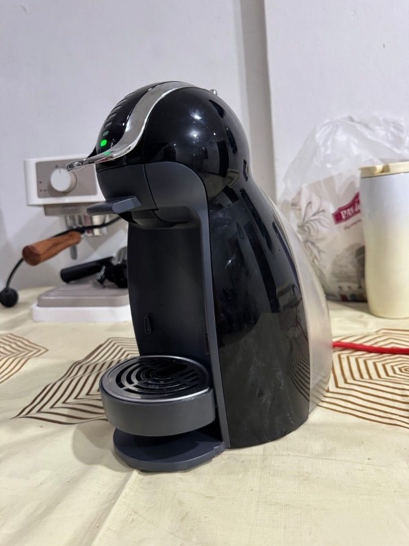 Nescafé Dolce Gusto Genio 2 Coffee Machine – 220V (Category: Coffee Machines & Makers) located in Lapu Lapu. Submitted by axl.rose05 (Listing ID 1469829080, Image 2). Description: Brand: Nescafé Dolce Gusto Model: Genio 2 Color: Black / Chrome Condition: Like new, good working condition Compact and easy-to-use coffee machine, perfect for home, office, or condo use. Enjoy your favorite coffee and other drinks using compatible Dolce Gusto capsules.