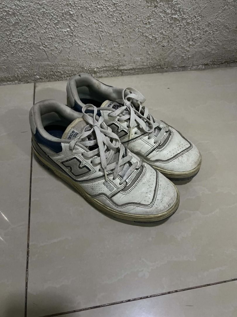 New Balance 550 low-top retro (Category: Sneakers) located in Marikina City. Submitted by rafafafaa (Listing ID 1469882731, Image 1). Description: - Brand: New Balance - Model: 550 - Colorway: White and Navy Blue Size 8.5 Mens - Style: Classic retro basketball shoes with lace-up closure - Condition: Pre-loved and well-worn with scuffs, dirt marks on leather uppers/midsoles, and regular sole wear - Perfect for cleaning up or rocking the beat look 