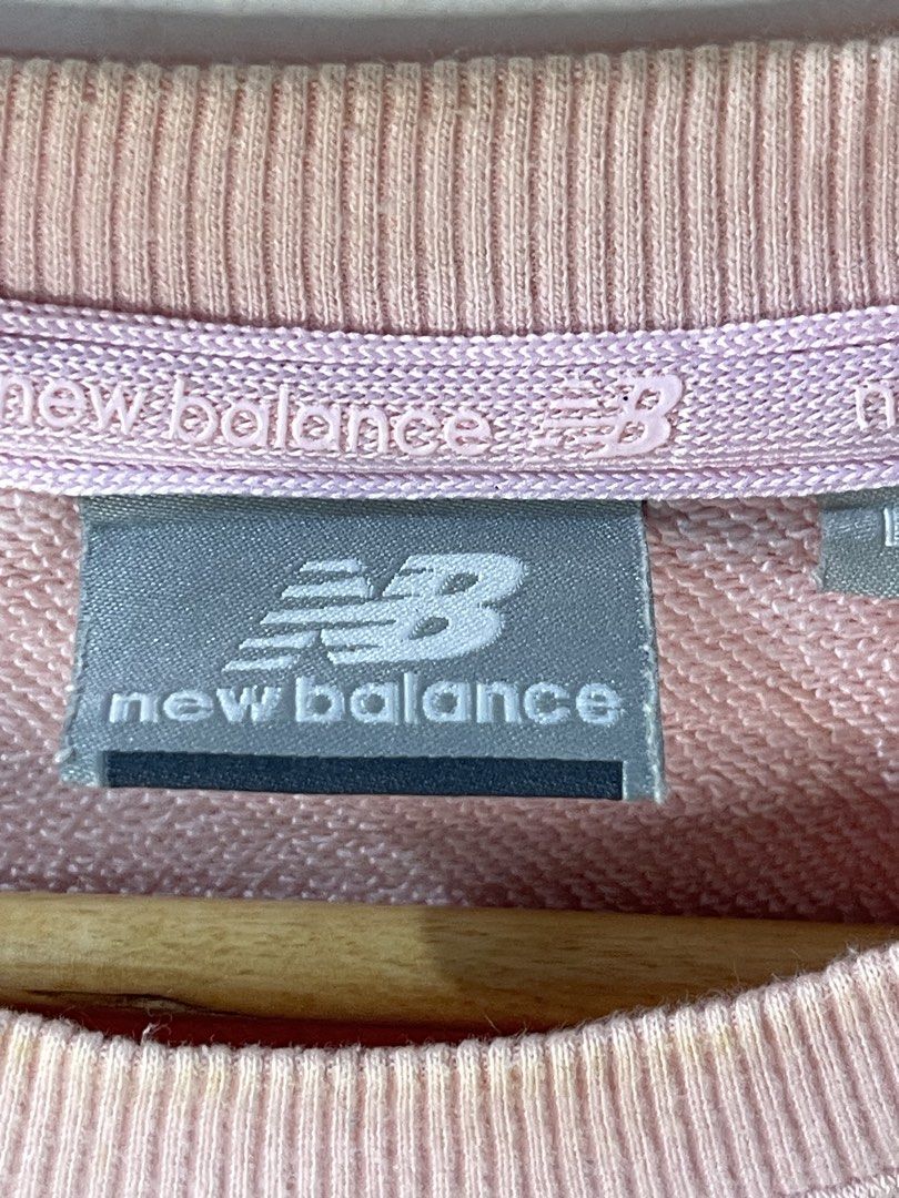 New Balance Pink Sweatshirt One Nine Zero Six (Category: Coats, Jackets and Outerwear) located in Cabagan. Submitted by blessingma81004 (Listing ID 1469770984, Image 3). Description: - Brand: New Balance (One Nine Zero Six Track Club collection) - Color: Pink - Size: Large (Width: 20.5", Length: 26.5") - Material: 86% cotton, 14% polyester - Details: Large tonal embroidered logo on chest, ribbed cuffs and hem - Condition: Minor wear, needs washin