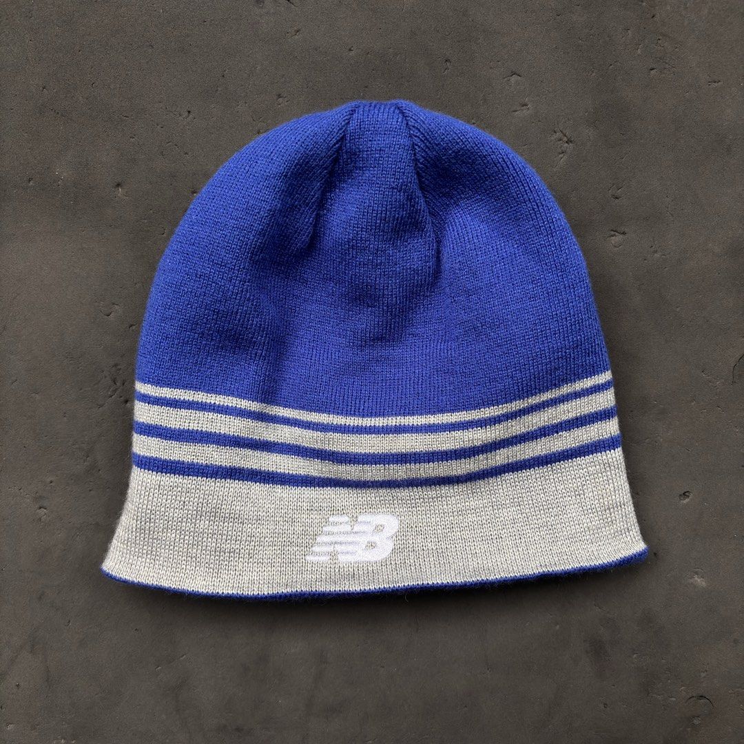 New Balance Reversible Flying NB Logo Beanie (Category: Caps & Hats) located in Manila. Submitted by loydgani (Listing ID 1469851177, Image 3). Description: Selling this ultra-versatile New Balance beanie. It is 100% reversible, giving you two distinct styles in one single hat to match different outfits! Two Looks in One: • Side 1: Royal blue knit with a massive iconic white “Flying NB” jacquard logo. • Side 2: Royal blue crown with a heather gra
