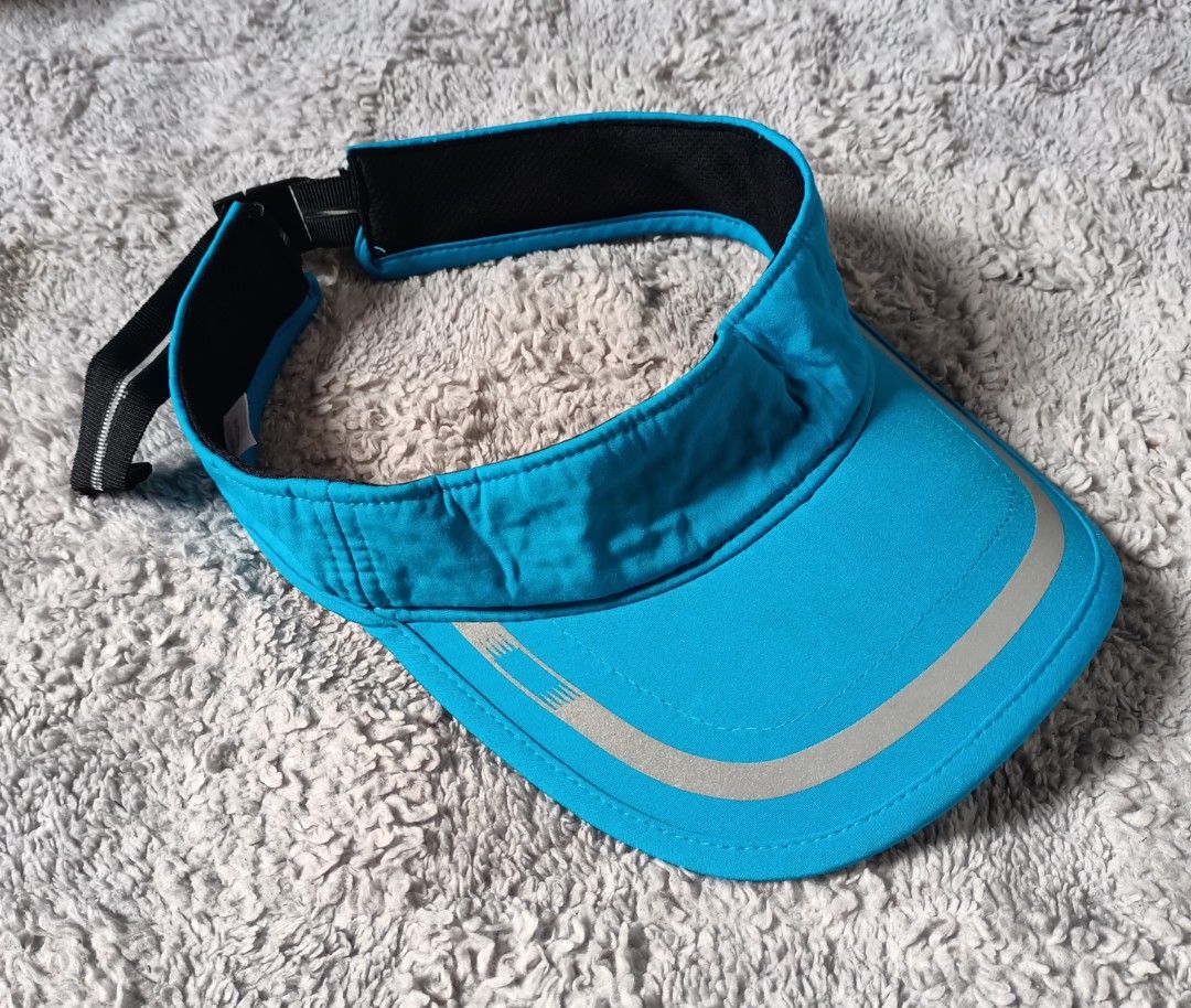 New balance visor cap (Category: Caps & Hats) located in Asingan. Submitted by arnelpalaris8 (Listing ID 1469846101, Image 3). Description: New balance Impact running visor OSFA VERYGOOD CONDITION • Model / Style: Impact Running Visor • Color: Blue / Light Blue • Material Composition: Typically 92% polyester and 8% spandex (or 100% polyester depending on the exact regional run) • Features: Moisture-wicking performance fabric, reflective piping an