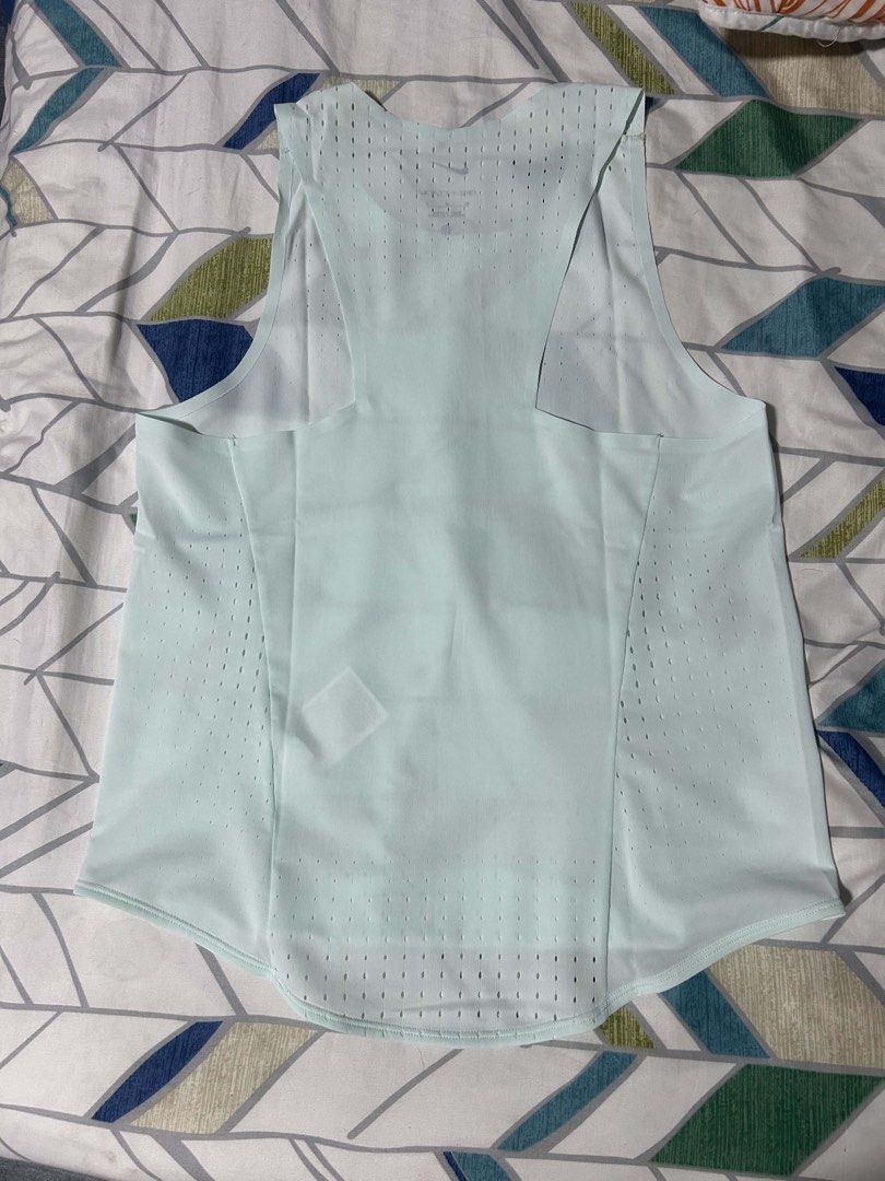 Nike Aeroswift ADV Running Singlet - Barely Green (Category: Others Tops) located in Davao. Submitted by wuuneet21 (Listing ID 1469877898, Image 2). Description: Nike Aeroswift ADV Running Singlet - Barely Green Small: 15-15.5 x 22.5-23 (3 pcs) Medium: 16-16.5 x 22.5-23 (1 pc) Original Price: 3795 Sale Price: 1799.