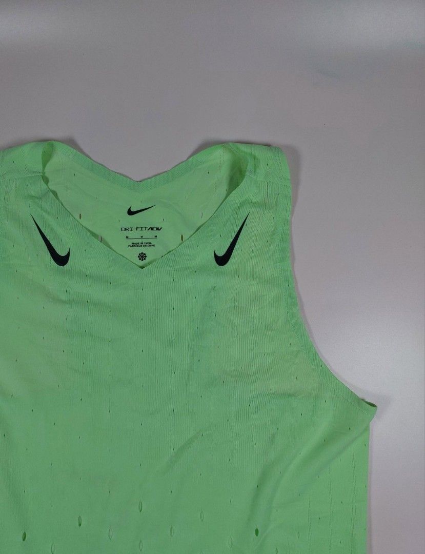 Nike Aeroswift Dri-Fit ADV Running Singlet (Category: Activewear) located in Cabuyao City. Submitted by runsapparelthrifted17 (Listing ID 1469817919, Image 3). Description: Nike Aeroswift Dri-Fit ADV Running Singlet M.Green Tag: Medium Actual measurement: Bust/Chest - 17 inches Length - 21 inches Excellent Condition: 9/10 Php1400+shipping fee Mode of payment: Via Gcash/Maya or BPI Message us for more details and transactions Thank you so much and