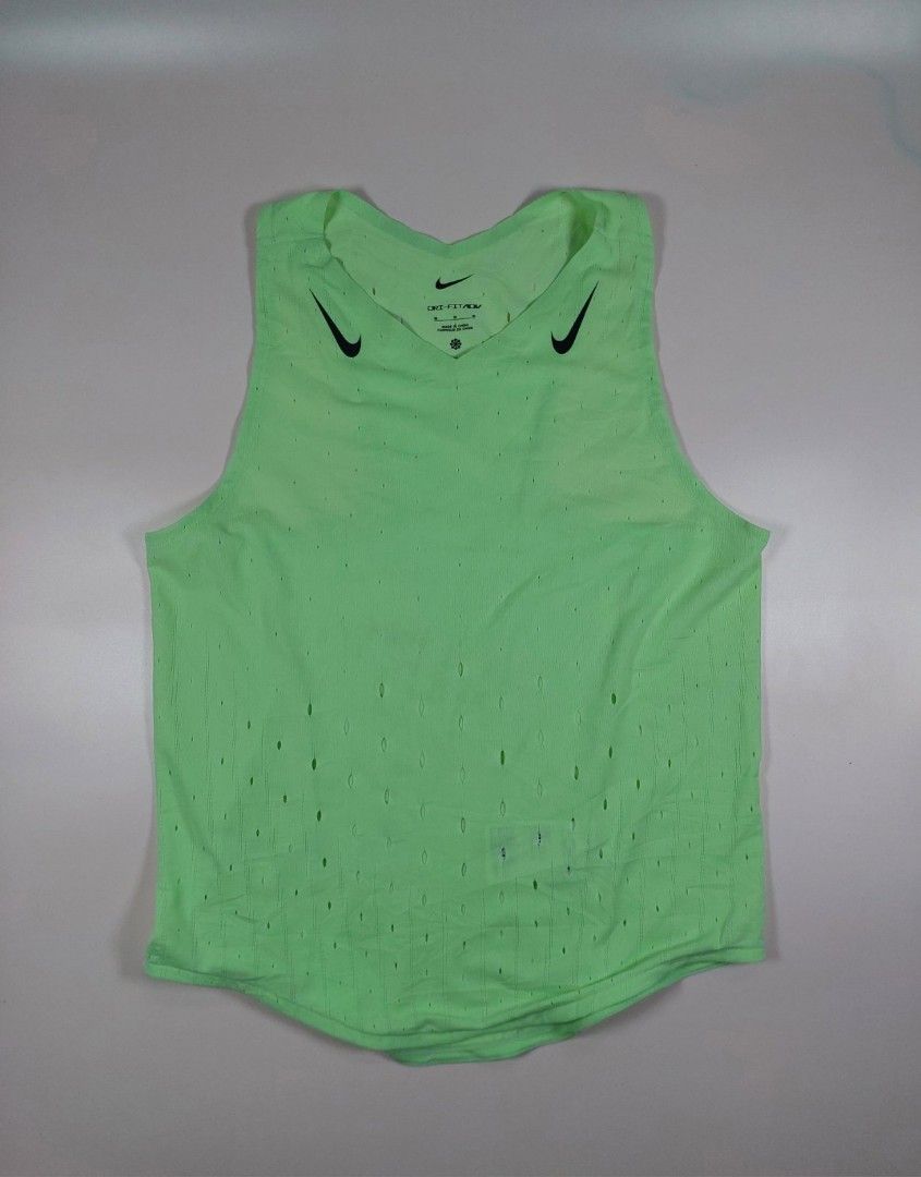 Nike Aeroswift Dri-Fit ADV Running Singlet (Category: Activewear) located in Cabuyao City. Submitted by runsapparelthrifted17 (Listing ID 1469817919, Image 1). Description: Nike Aeroswift Dri-Fit ADV Running Singlet M.Green Tag: Medium Actual measurement: Bust/Chest - 17 inches Length - 21 inches Excellent Condition: 9/10 Php1400+shipping fee Mode of payment: Via Gcash/Maya or BPI Message us for more details and transactions Thank you so much and