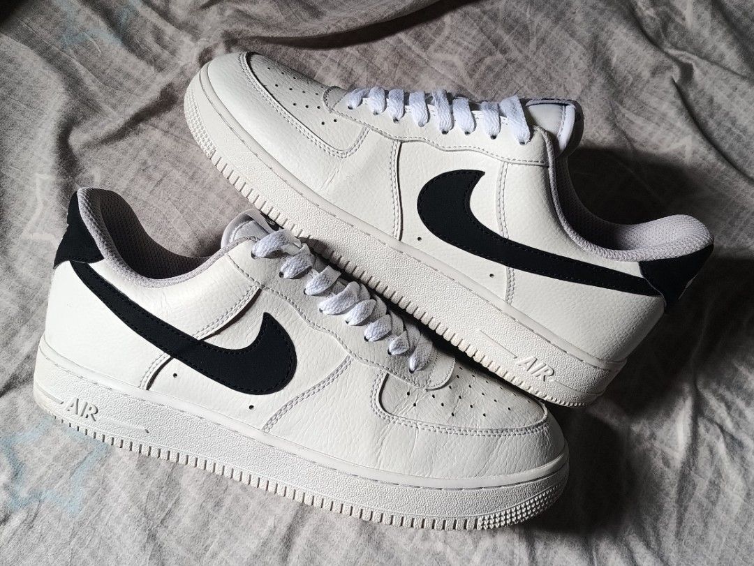 Nike Air Force 1 Low White Black Size US 9.5 (Category: Sneakers) located in Manila. Submitted by keenforest.c4b4c0 (Listing ID 1469865321, Image 1). Description: - Brand: Nike Air Force 1 Low - Colorway: White with Black Swoosh and heel tab - Size: US 9.5 / UK 8.5 / EUR 43 - Material: Leather upper with standard rubber sole - Condition: Pre-loved, worn a few times with slight toe box creasing - Style: Clean look, classic silhouette, perfect for 