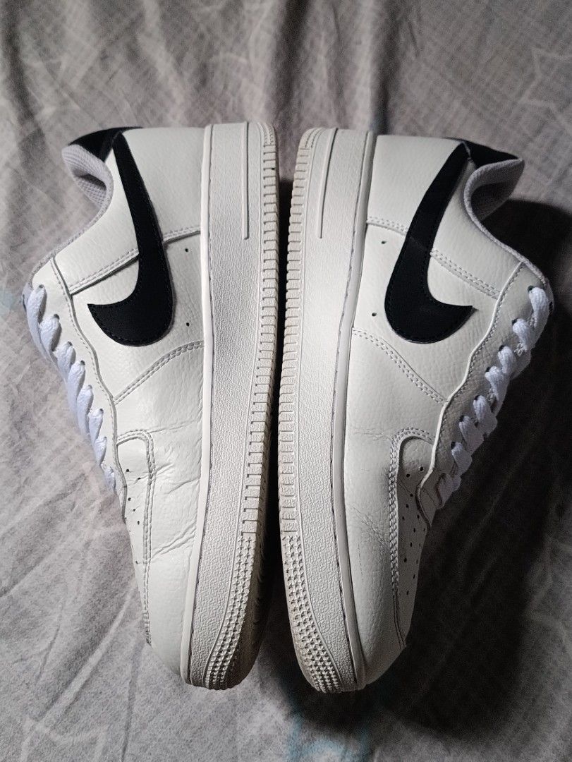Nike Air Force 1 Low White Black Size US 9.5 (Category: Sneakers) located in Manila. Submitted by keenforest.c4b4c0 (Listing ID 1469865321, Image 3). Description: - Brand: Nike Air Force 1 Low - Colorway: White with Black Swoosh and heel tab - Size: US 9.5 / UK 8.5 / EUR 43 - Material: Leather upper with standard rubber sole - Condition: Pre-loved, worn a few times with slight toe box creasing - Style: Clean look, classic silhouette, perfect for 