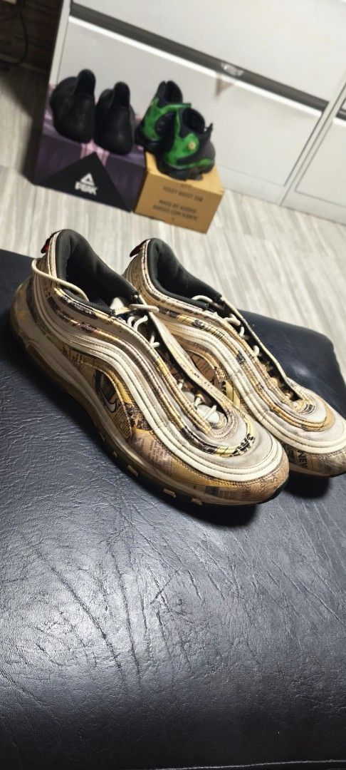 Nike Air Max 97 Newspaper Print (Category: Sneakers) located in Manila. Submitted by ds.gaming (Listing ID 1469930609, Image 1). Description: Selling Nike Air Max 97 with rare newspaper print in cream and brown. Soles show some dirt and wear, but air units are intact and traction is great. Size 14 Pickit up here in Makati or get it picked up.