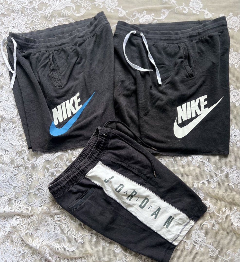 Nike and Jordan Black Shorts Bundle (Category: Shorts) located in Manila. Submitted by trustedmichael. (Listing ID 1469801341, Image 1). Description: Big sizes Alumni/ Jordan Xl and XXL Adult size Jordan size Large Normal Adult size 8.5-8.7/10 Cr✅ - Bundle of 3 comfortable casual athletic shorts - 2x Black Nike shorts featuring white and blue swoosh logos and adjustable white drawstrings - 1x Black Jordan shorts featuring a wide white stripe acro