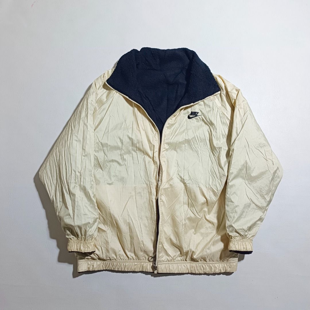 Nike Bigswoosh Reversible Sherpa Jacket (Category: Coats, Jackets and Outerwear) located in Baguio. Submitted by freshmarket_2600 (Listing ID 1469876973, Image 2). Description: 1580+sf Brand: Nike Bigswoosh Sherpa Reversible Tags: Cut tags Size: Large Dimension: L28W24 Condition: Excellent Color rate: 10/10 Color: Black-Beige Issue/s: None.