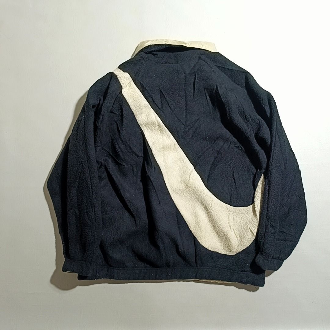 Nike Bigswoosh Reversible Sherpa Jacket (Category: Coats, Jackets and Outerwear) located in Baguio. Submitted by freshmarket_2600 (Listing ID 1469876973, Image 3). Description: 1580+sf Brand: Nike Bigswoosh Sherpa Reversible Tags: Cut tags Size: Large Dimension: L28W24 Condition: Excellent Color rate: 10/10 Color: Black-Beige Issue/s: None.