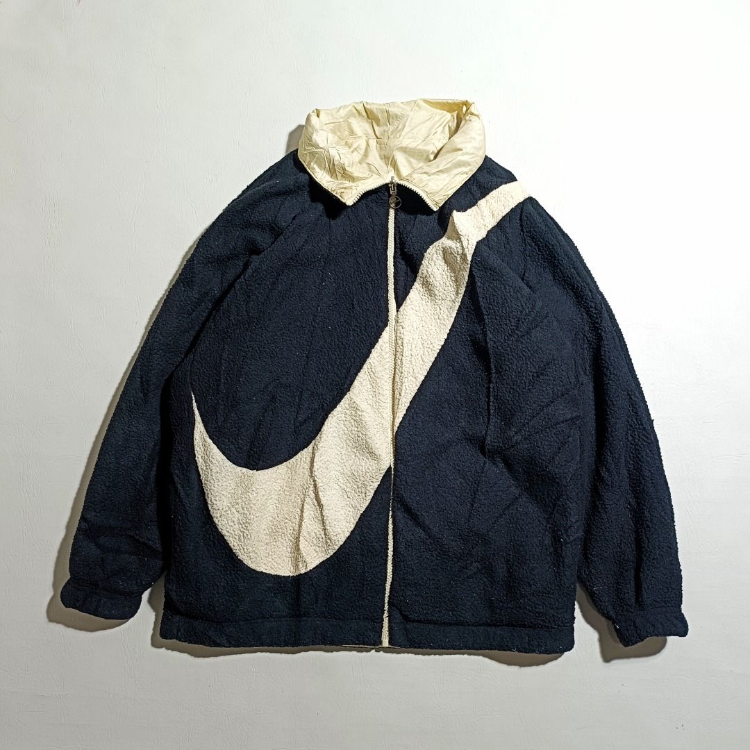 Nike Bigswoosh Reversible Sherpa Jacket (Category: Coats, Jackets and Outerwear) located in Baguio. Submitted by freshmarket_2600 (Listing ID 1469876973, Image 1). Description: 1580+sf Brand: Nike Bigswoosh Sherpa Reversible Tags: Cut tags Size: Large Dimension: L28W24 Condition: Excellent Color rate: 10/10 Color: Black-Beige Issue/s: None.