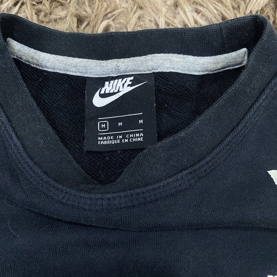 Nike Black Crewneck Sweatshirt Size M (Category: Coats, Jackets and Outerwear) located in Cagayan de Oro. Submitted by sepamorash53558 (Listing ID 1469797788, Image 3). Description: - Brand: Nike - Item: Classic Crewneck Sweatshirt - Color: Black with embroidered logo on chest - Size: Medium - Material: 80% Cotton, 20% Polyester blend for cozy wear - Features: Ribbed collar, cuffs, and hem - Condition: Great everyday staple, clean interior tags i