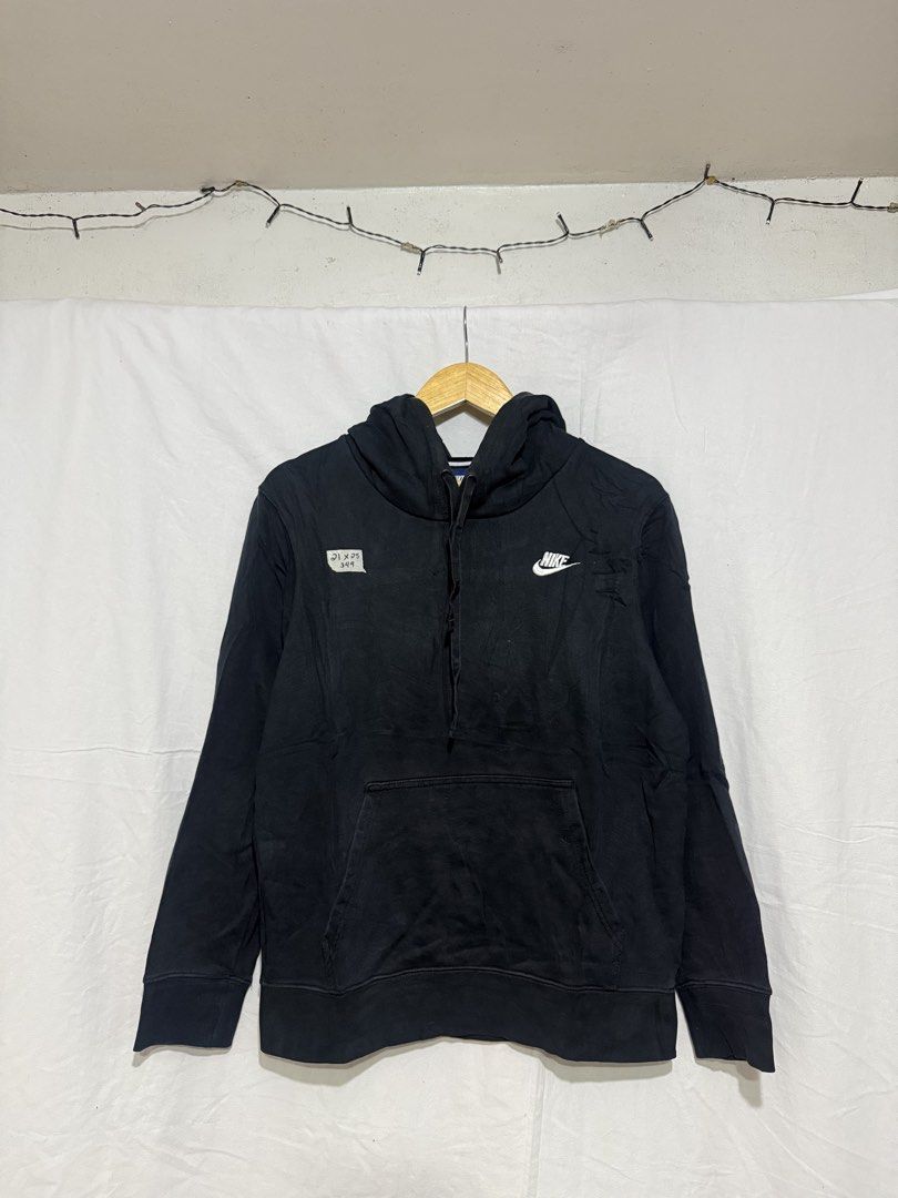 Nike Black Hoodie with Front Pocket (Category: Hoodies) located in Quezon City. Submitted by dapanaaaay (Listing ID 1469926037, Image 1). Description: - Color: Classic Black - Brand: Nike (Original) - Fit: Standard pullover style - Features: Adjustable hood drawstrings, roomy kangaroo pocket, ribbed cuffs and hem - Detail: Small white embroidered Nike swoosh on left chest with a stylish distressed detail on the right chest - Condition: Excellent 