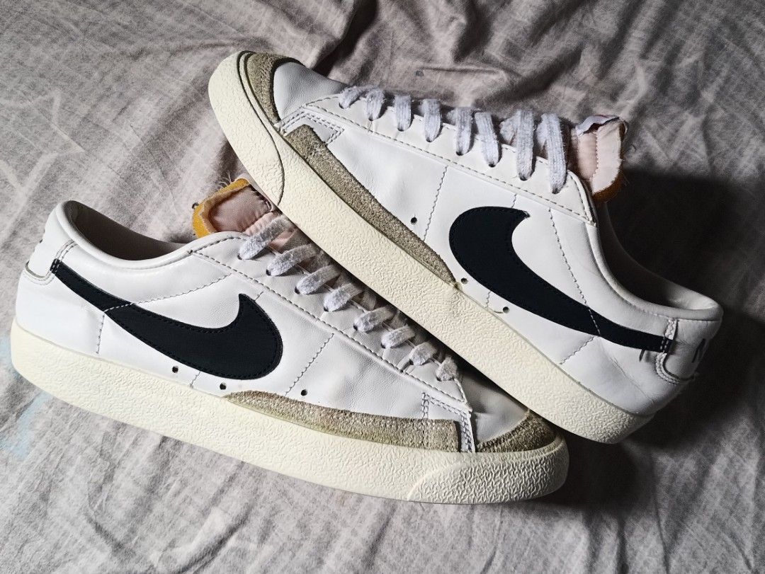 Nike Blazer Low '77 Vintage White Black (Category: Sneakers) located in Manila. Submitted by keenforest.c4b4c0 (Listing ID 1469867054, Image 1). Description: White leather low-top sneakers from Nike. Black swoosh on the sides with suede overlays at the toe and forefoot. Exposed foam tongue design with retro Nike branding on the tongue tag and heel tab. Textured rubber sole with herringbone tread pattern. Clean white laces included..