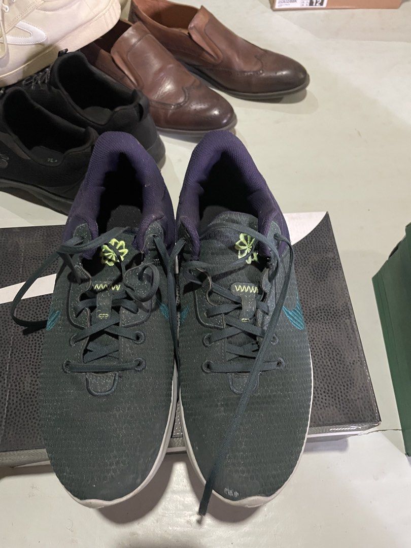 Nike Flex Dark Green Running Shoes (Category: Sneakers) located in Davao. Submitted by houkaygoods (Listing ID 1469890887, Image 1). Description: - Brand: Nike - Color: Dark green with teal swoosh and purple inner lining - Soles: White - Inclusions: Laces attached - Condition: Good, reliable daily training pair - Location: Metro Manila, ready to ship or meetup.