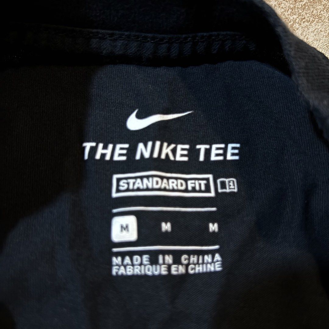 Nike Just Do It Graphic Black T-Shirt (Category: Tshirts & Polo Shirts ) located in Dipolog. Submitted by dionato (Listing ID 1469870083, Image 3). Description: - Brand: Nike - Color: Black - Size: Medium (Standard Fit) - Material: Soft, breathable cotton - Design: Striking graphic prints on front and back with classic Swoosh details - Condition: Excellent / Brand New - Perfect for: Casual daily wear, streetwear, and gym sessions - Origin: Made i