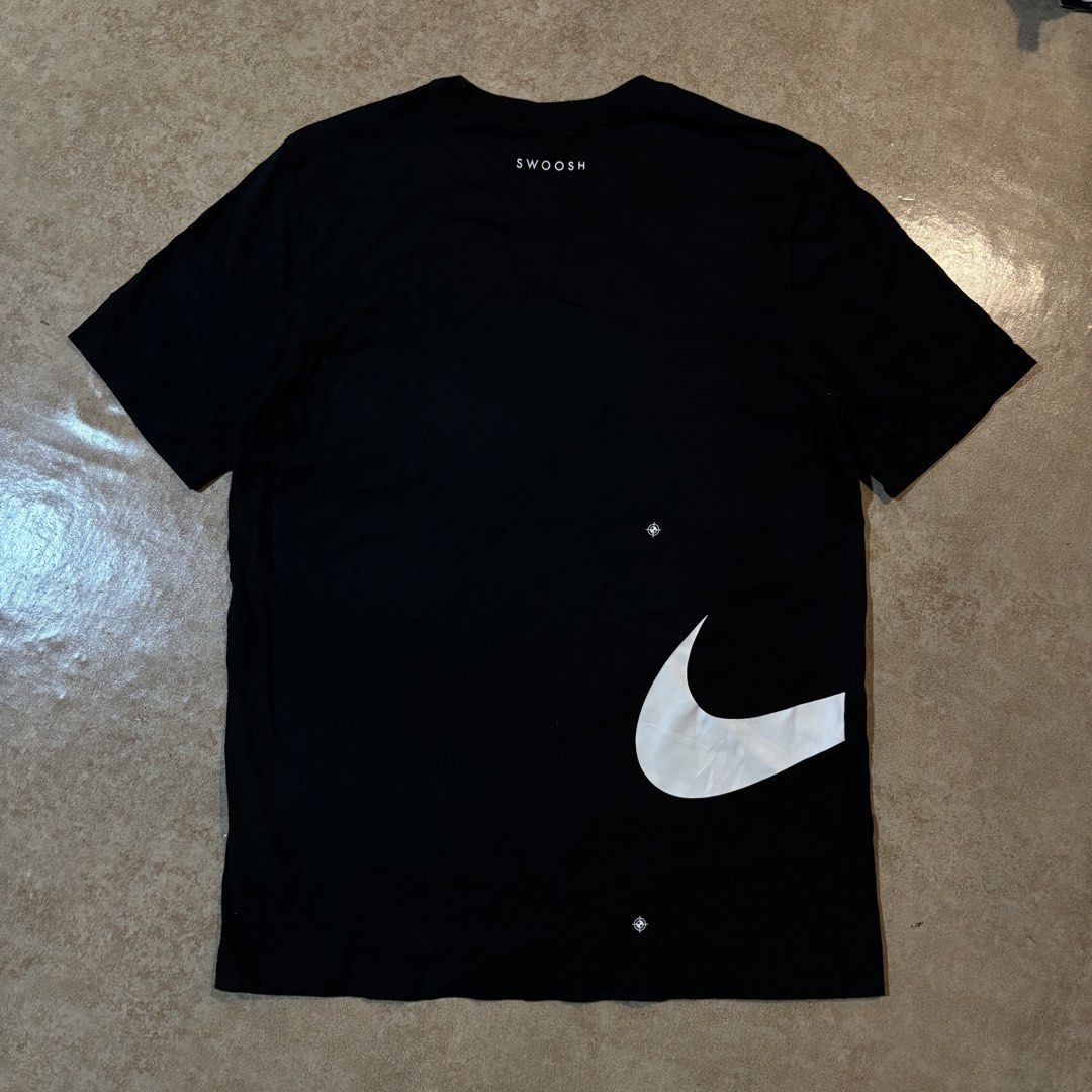 Nike Just Do It Graphic Black T-Shirt (Category: Tshirts & Polo Shirts ) located in Dipolog. Submitted by dionato (Listing ID 1469870083, Image 2). Description: - Brand: Nike - Color: Black - Size: Medium (Standard Fit) - Material: Soft, breathable cotton - Design: Striking graphic prints on front and back with classic Swoosh details - Condition: Excellent / Brand New - Perfect for: Casual daily wear, streetwear, and gym sessions - Origin: Made i