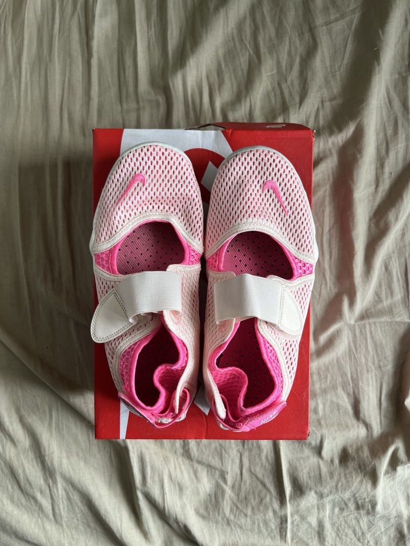 Nike Rift 2 GS (Category: Sneakers) located in Paranaque City. Submitted by nifty_goodies (Listing ID 1469796123, Image 1). Description: Nike Rift 2 GS Size - 6Y fits 7.5us womens Issue - need cleaning outsole Used only during our Vietnam Trip With original box.