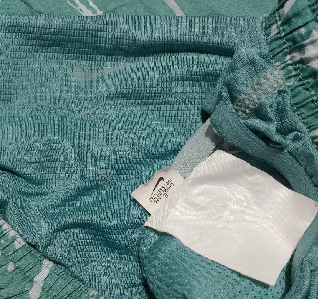 Nike Running Division Short (Category: Shorts) located in Davao. Submitted by thrifttayo (Listing ID 1469816424, Image 3). Description: Small on tag W 27-30 L 13 No Issue ASNEW Condition .