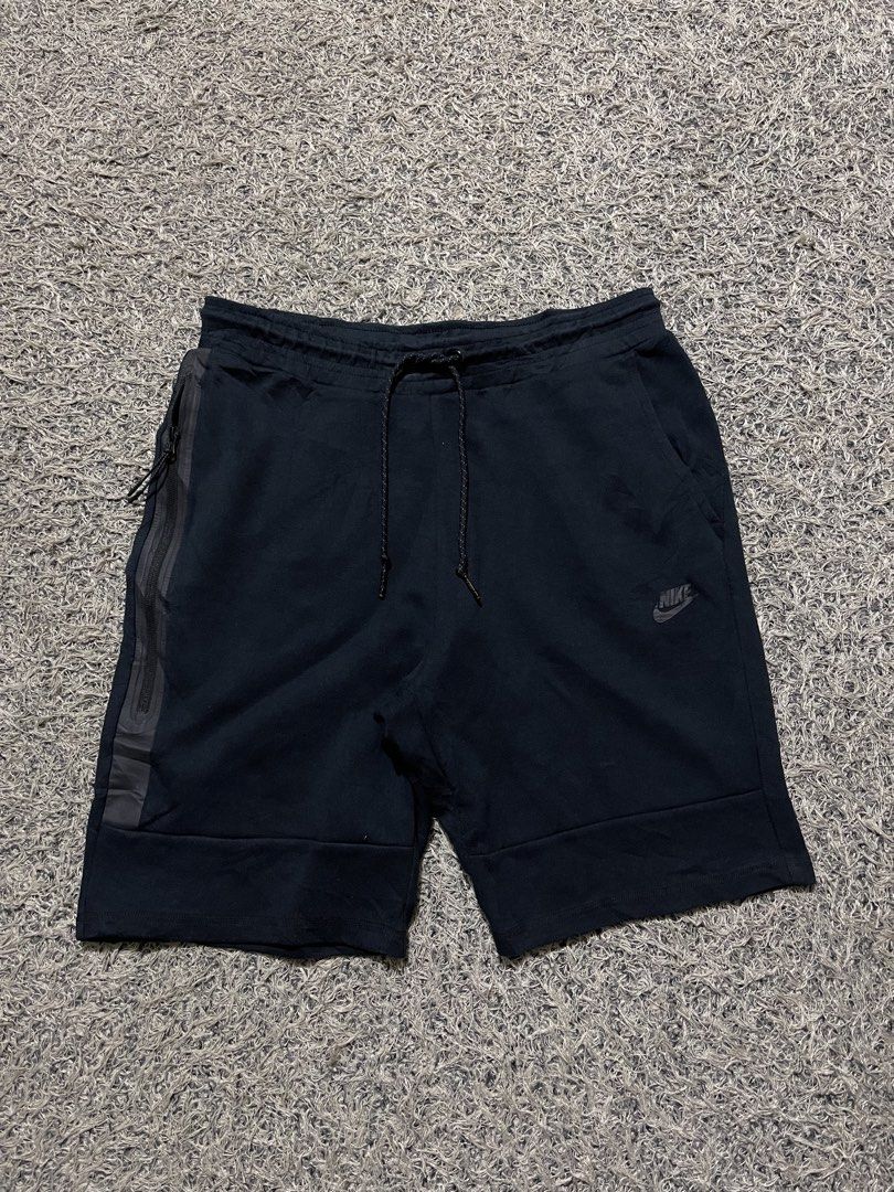 Nike Tech Fleece Black Shorts (Category: Shorts) located in Palompon. Submitted by keenbird.431209 (Listing ID 1469814031, Image 1). Description: - Color: Classic Black - Material: Premium Nike Tech Fleece for ultimate comfort - Fit: Adjustable drawstring waist for a custom fit - Pockets: Secure zippered side pocket plus open side pockets - Branding: Signature Nike logo on the left leg - Versatile: Perfect for gym workouts, runs, or everyday stre