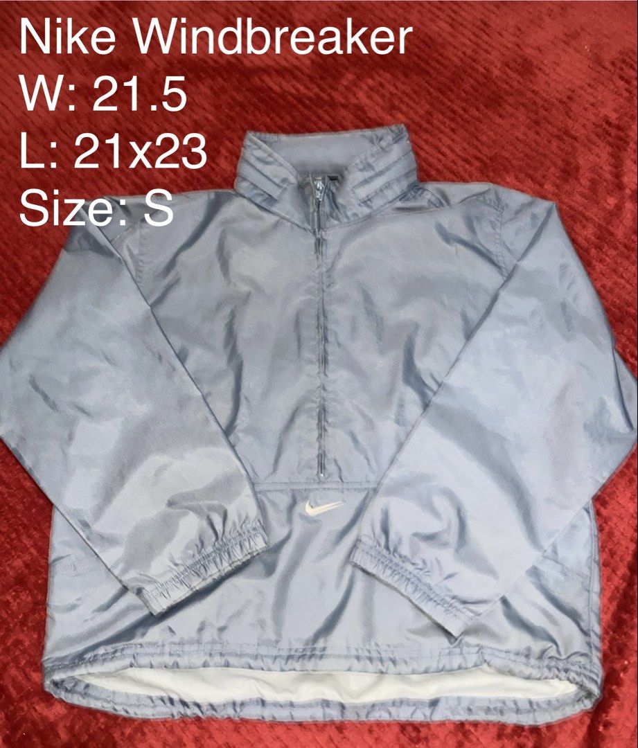 Nike Windbreaker Light Blue Size S (Category: Coats, Jackets and Outerwear) located in Manila. Submitted by almazankyle19 (Listing ID 1469803839, Image 1). Description: - Brand: Nike - Item: Light blue windbreaker jacket - Size: Small - Measurements: Width 21.5", Length 21" - 23" - Design: Quarter-zip front, high collar, elastic cuffs and hem - Branding: Small embroidered white Nike swoosh on the chest and back collar - Style: Clean look, perfect