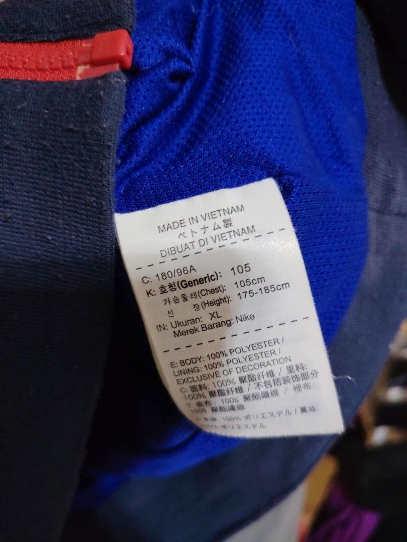 Nike Windrunner Jacket Red Blue Navy XL (Category: Coats, Jackets and Outerwear) located in Baguio. Submitted by jnjayceelbrn (Listing ID 1469844351, Image 3). Description: - Brand: Nike - Style: Hooded Windrunner Jacket - Colorway: Red, Royal Blue, and Dark Navy - Features: Full zip closure, contrasting white drawstrings, and red zippered side pockets - Size: XL (Best fits chest 105cm, height 175-185cm) - Material: 100% polyester body and lining