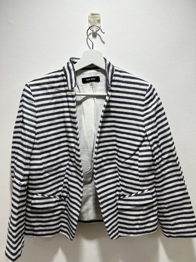 Nine West Striped Blazer Jacket Size 8 (Category: Coats, Jackets and Outerwear) located in Manila. Submitted by isabelle_1104 (Listing ID 1469917675, Image 1). Description: - Brand: Nine West - Style: Black and white striped blazer - Size: 8 - Features: Structured neckline, front pockets, button details on sleeve cuffs - Interior: Fully lined - Condition: Clean, ready to wear - Perfect for: Work or casual outings.