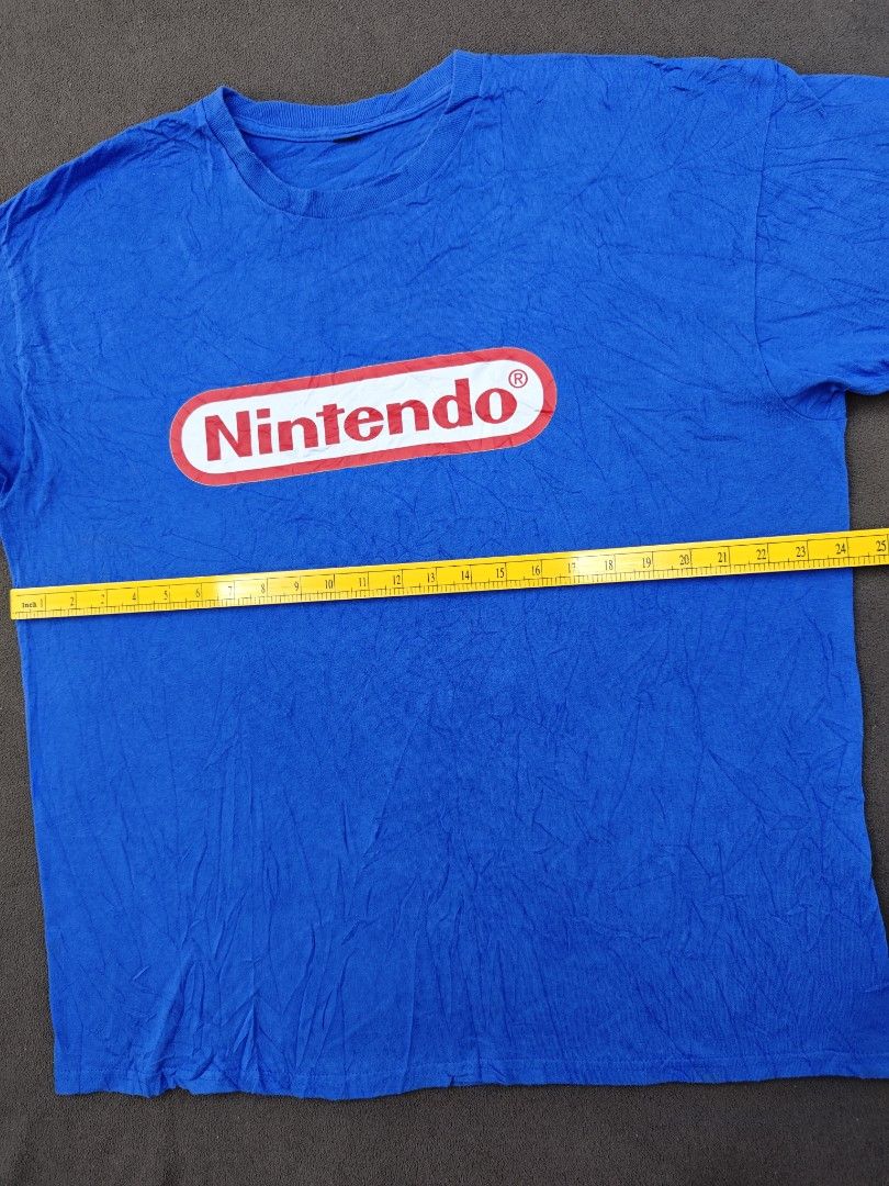 Nintendo Blue T-shirt with Logo (Category: Tshirts & Polo Shirts ) located in Bulacan. Submitted by pzj_thrift (Listing ID 1469798362, Image 3). Description: condition 9/10 color rate 9/10 no issue.