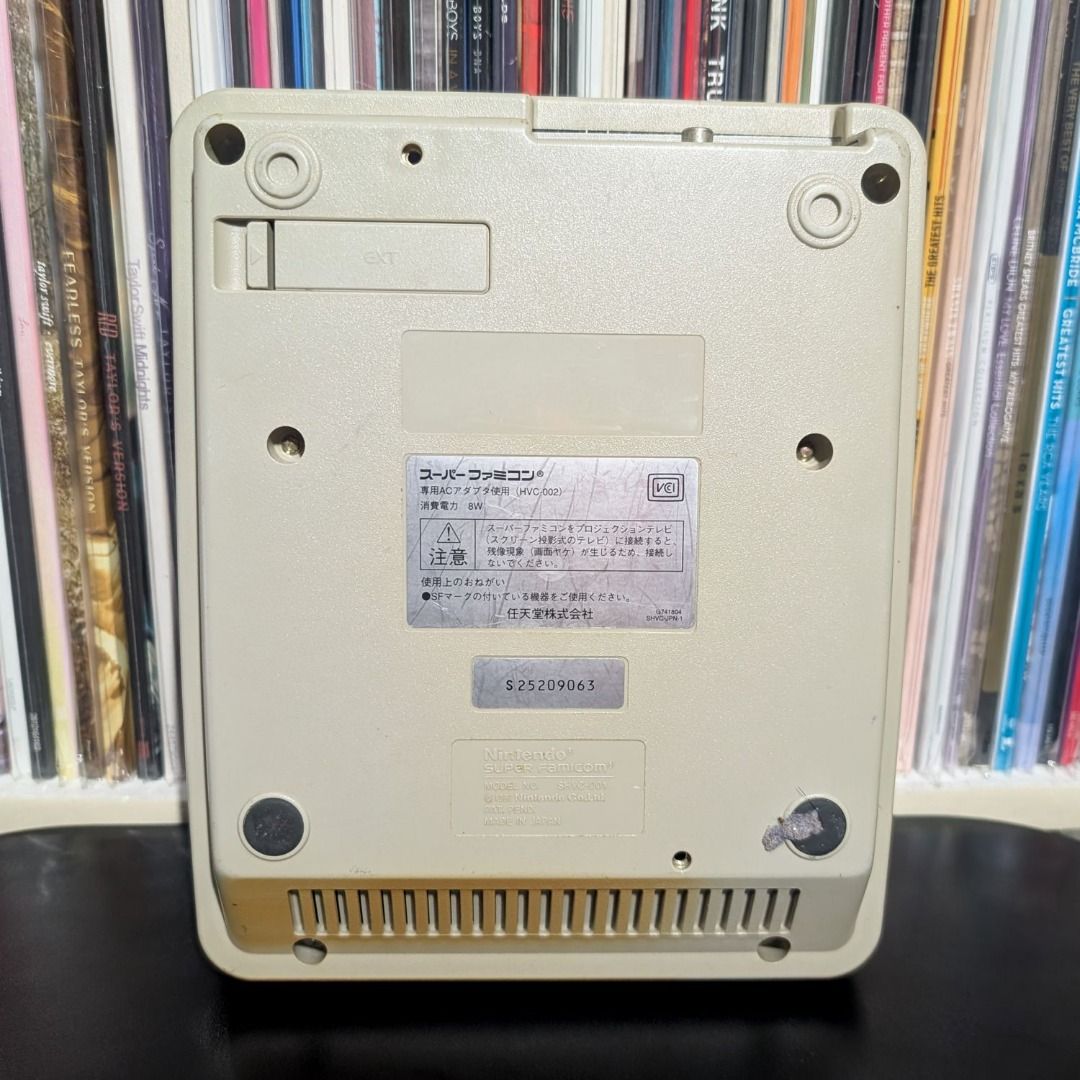 Nintendo Super Famicom Console (1Chip-01 Board) (Category: Nintendo) located in Pagadian. Submitted by rikzmm (Listing ID 1469857508, Image 2). Description: Used, Nintendo Super Famicom Console Unit - 1 CHIP Board *** AS IS / TESTED with Power, no display. For Repair or Parts. Yellowish Shell. - Serial Number: S25209063 / Board: SNS-1CHIP-01 (JAPAN) - Visible yellowing on top and front plastic shell due to age - Console only (no controllers, powe