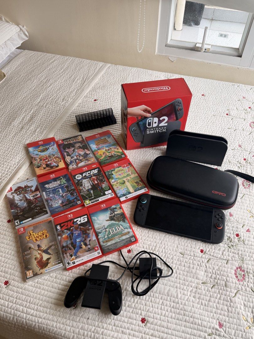 Nintendo Switch Console Bundle with Games and Accessories (Category: Nintendo) located in Cebu City. Submitted by cebubagspersonalpreloved (Listing ID 1469784096, Image 1). Description: - Complete console bundle with dock, power adapter, and carrying case - Includes original box (everything pictured goes together) - Comes with 9 physical games: Mario Kart World, Fairy Tail 2, Animal Crossing, Monster Hunter Rise Sunbreak, Pokémon Legends Z-A, EA 