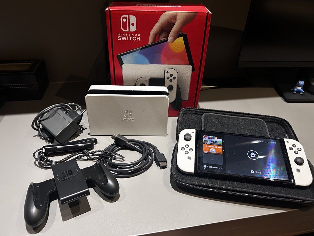 Nintendo Switch OLED model (Category: Nintendo) located in Paranaque City. Submitted by gael09 (Listing ID 1469821196, Image 1). Description: Pre loved, Used with care - Complete with original box, dock, joycons, controller, charger, and cables. - Comes with free Case PM for any questions :) .