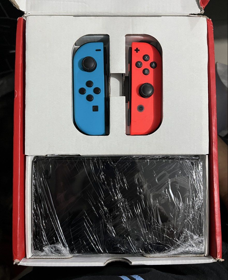 Nintendo Switch OLED Model (Category: Nintendo) located in Manila. Submitted by reigven.shania (Listing ID 1469759337, Image 1). Description: - Nintendo Switch OLED complete only.