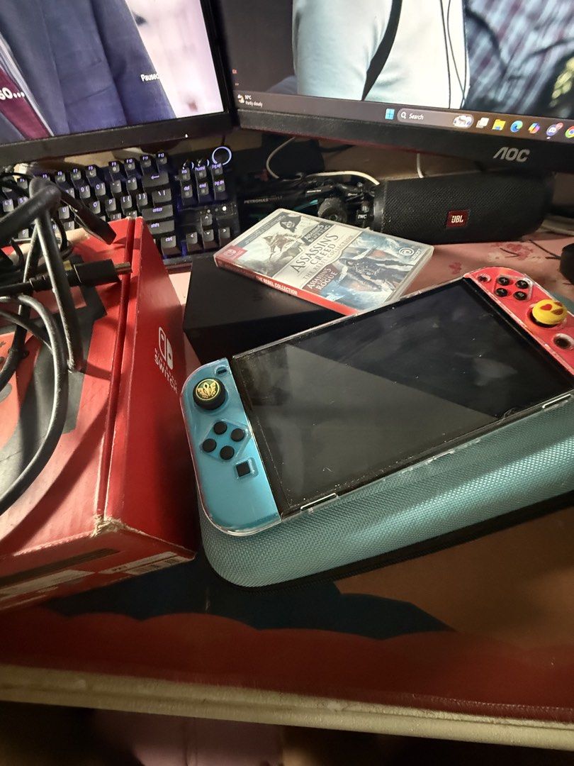 Nintendo Switch Oled Neon (Category: Other Gadgets) located in Manila. Submitted by banoskiii (Listing ID 1469871199, Image 1). Description: Selling my Nintendo Switch OLED Neon. Complete with accessories, extra protective cases, a 128GB SD card, and a physical game. Perfect for gaming at home or on the go. Complete Inclusions: * Nintendo Switch OLED Console * Neon Red & Blue Joy-Cons * Nintendo Switch Dock * Joy-Con Grip * Joy-Con Wrist Straps *