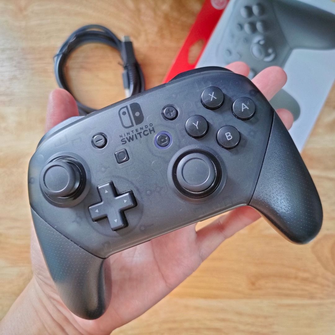 Nintendo Switch Pro Controller Grey (HK) (Category: Controllers) located in Makati City. Submitted by Xerberus (Listing ID 1469927817, Image 3). Description: Nintendo Switch Pro Controller Grey (HK) The Nintendo Switch Pro Controller is the gold standard for the system. Not only is it the best controller you can buy for the Switch, but its versatility makes it a terrific controller for many other systems, including Android, macOS, and Windows. Pr