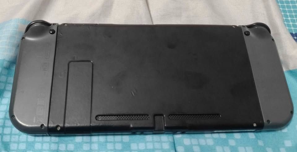 Nintendo Switch [V1 / Unpatched / 256gb] (Category: Nintendo) located in Manila. Submitted by miggyong1661701 (Listing ID 1469945213, Image 3). Description: Pre-loved Nintendo Switch, V1 Erista, Unpatched (RCM exploit available). Check the 2nd photo for the serial number of the console XAJ10004775729. Includes: - Nintendo Switch V1 Unpatched - Nintendo Switch Dock - Nintendo Switch 220V Charger (3-pin; UK) - Accessories: Joy-con straps, Joy-con g