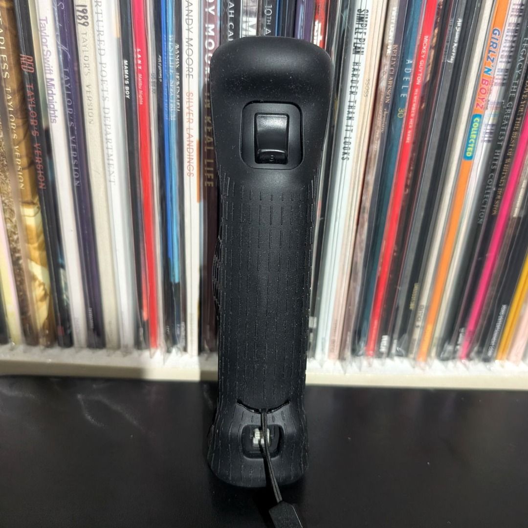Nintendo Wii Remote Controller with Motion Plus - Used (Category: Controllers) located in Pagadian. Submitted by rikzmm (Listing ID 1469875932, Image 2). Description: Nintendo Wii Remote Controller with Motion Plus - Used **USED, Tested Working. No battery included. - 100% Original Nintendo Wii Remote Controller with detachable Motion Plus - Includes newly replace protective black silicone sleeve - Comes with a secure black wrist strap - All butt