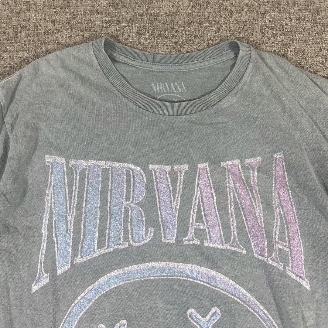 Nirvana Smiley Band Official Merch T-shirt (Category: Tshirts & Polo Shirts ) located in Los Banos. Submitted by adothrift (Listing ID 1469855262, Image 3). Description: Nirvana Smiley Band Official Merch T-shirt Size: M-L Dimensions: Width - 20 Length - 27.