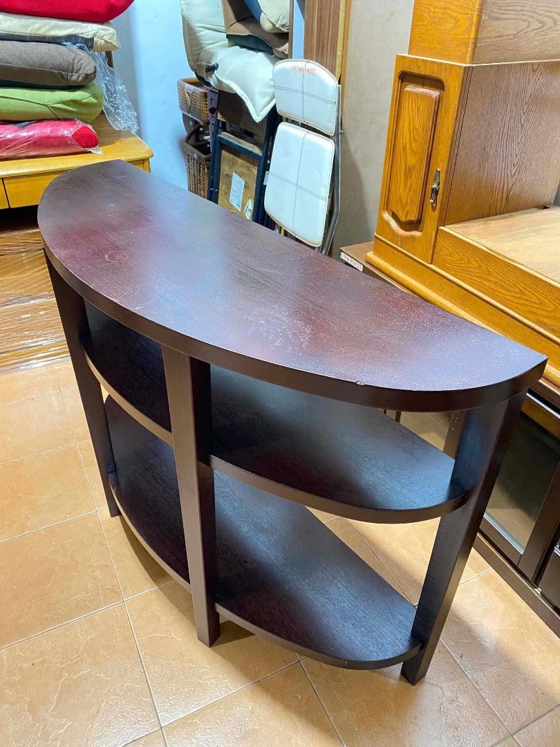 Nitori 3-Tier Half-Moon Console Table Display Shelves (Category: Shelves, Cabinets & Racks) located in Quezon City. Submitted by dannikkishoppe2 (Listing ID 1469946494, Image 2). Description: Nitori 3-Tier Half-Moon Console Table Display Shelves‼️₱5500‼️ space-saving entryway or accent piece featuring a classic demilune shape, open storage shelves, and a deep espresso/dark brown wood finish Please manage your expectations as there might be minima