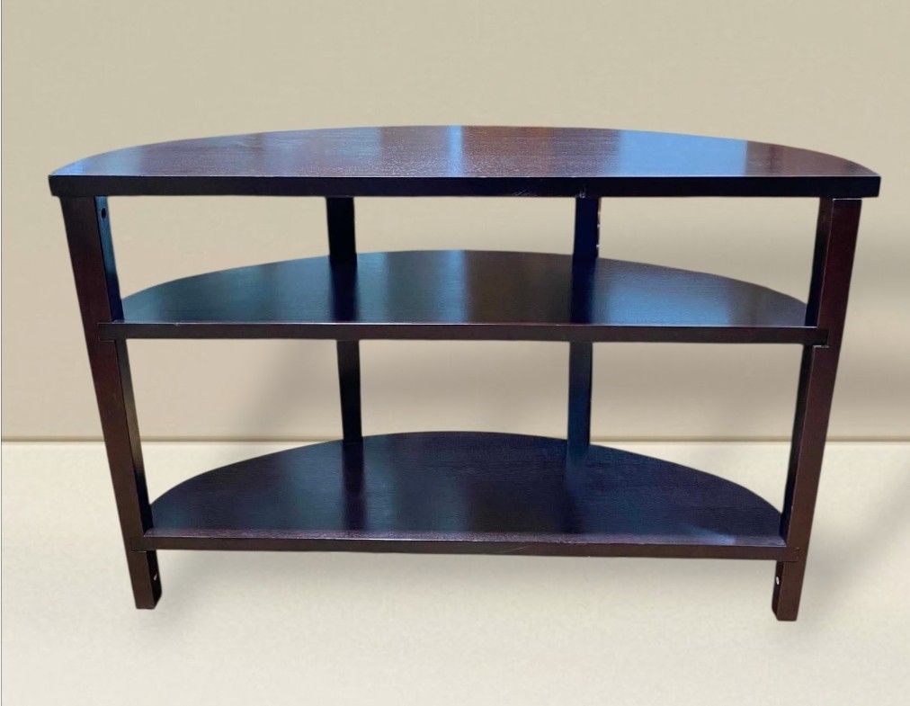 Nitori 3-Tier Half-Moon Console Table Display Shelves (Category: Shelves, Cabinets & Racks) located in Quezon City. Submitted by dannikkishoppe2 (Listing ID 1469946494, Image 1). Description: Nitori 3-Tier Half-Moon Console Table Display Shelves‼️₱5500‼️ space-saving entryway or accent piece featuring a classic demilune shape, open storage shelves, and a deep espresso/dark brown wood finish Please manage your expectations as there might be minima