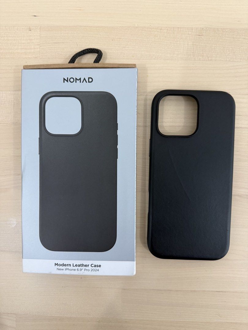Nomad Modern Leather Case for iPhone 16 Pro Max (Category: Cases & Sleeves) located in Pasig City. Submitted by miggyyusay (Listing ID 1469779304, Image 1). Description: Lightly used case, no dents. Only normal wear on the leather..