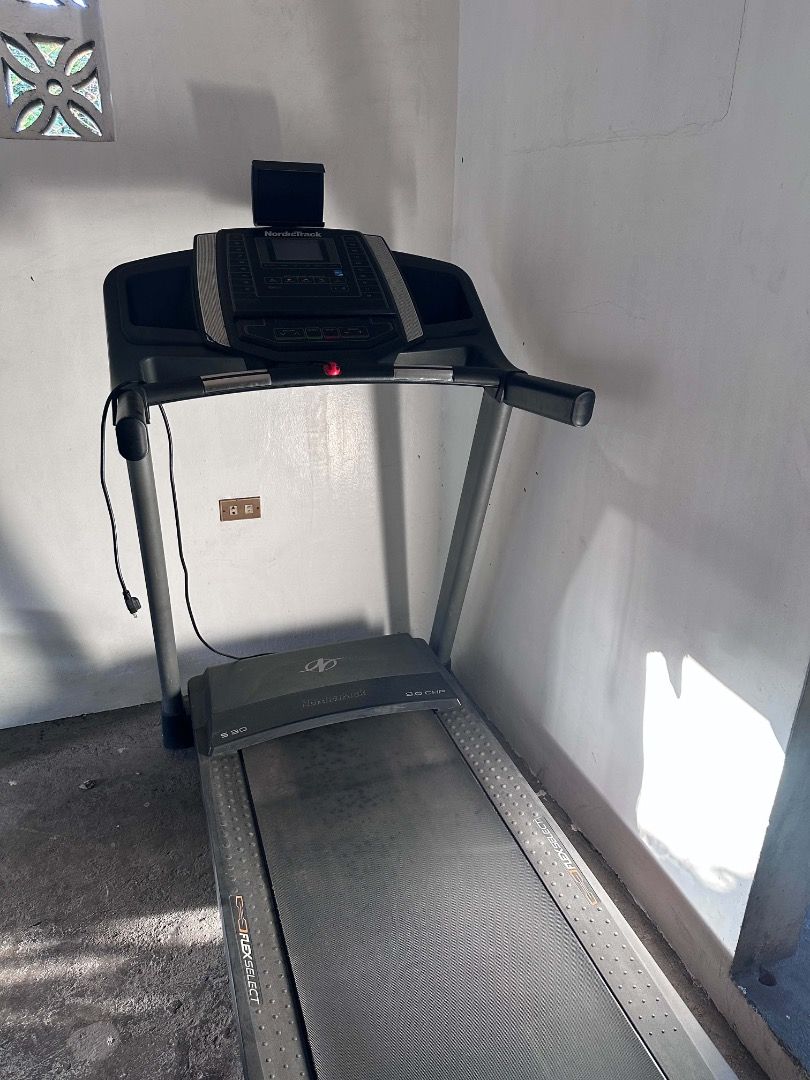 NordicTrack Treadmill (Category: Cardio & Fitness Machines) located in Cabuyao City. Submitted by rdtrmt (Listing ID 1469885886, Image 2). Description: - Brand: NordicTrack - Color: Black - Console: Digital panel with adjustable speed and incline settings - Design: Space-saving foldable deck for easy storage - Build: Heavy-duty frame, power cord included - Ideal for home cardio and fitness routines - Condition: It still in good condition and is s