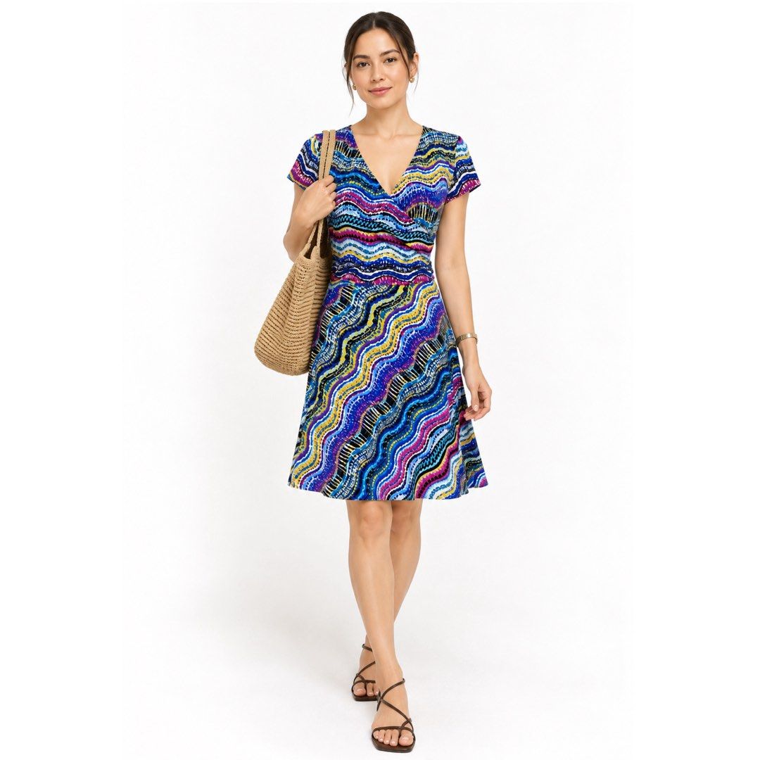 NTCO Nomadic Traders Multicolor Abstract Print Jersey Wrap Dress | Large (Category: Dresses) located in San Jose del Monte. Submitted by vanessabarredo (Listing ID 1469937805, Image 1). Description: Condition: Excellent Beautiful multicolored abstract print dress featuring a flattering surplice V-neckline, short sleeves, defined waist, and flowy A-line skirt. * Stretchable jersey fabric * Soft and comfortable * Wrap-style bodice * Waist tie at th