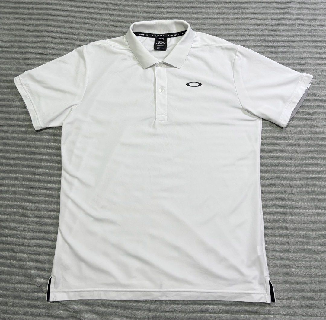 Oakley white poloshirt (Category: Activewear) located in Kawit. Submitted by samfuentebella09 (Listing ID 1469862000, Image 1). Description: OAKLEY WHITE POLOSHIRT✅ ▪️Size Medium on tag✅ ▪️Width”21 x 26”Length✅ ▪️Excellent Condition 9/10✅ ▪️Color Rate 10/10✅ ▪️Good As New✅ Add sf💸 Pm🔑.