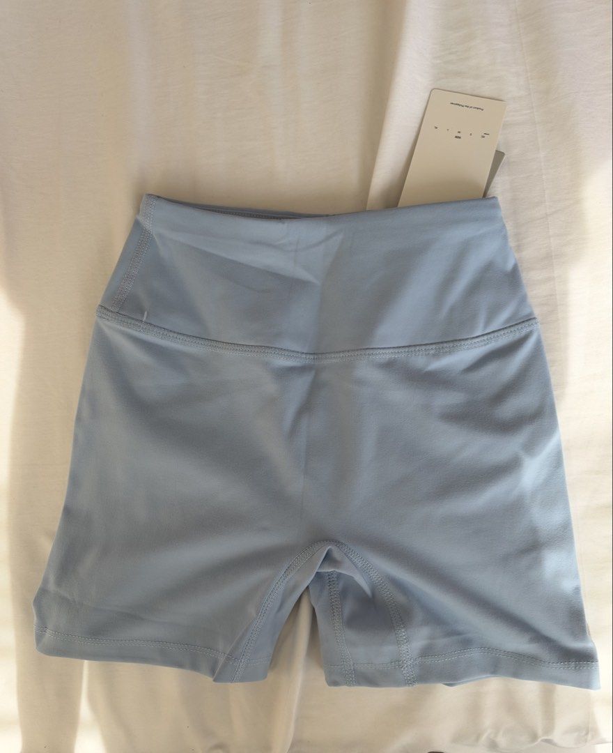 OAT active Core Invisible Scrunch Shorts [Frost] (Category: Shorts) located in Manila. Submitted by litolmissshopaholic_ (Listing ID 1469770156, Image 3). Description: - Brand: OAT RFS: Wrong Order Original price: 1650 - Color: Light blue (Frost) - Condition: Brand new with tags (Never worn) - Fit: High-waisted with a flattering scrunch back detail - Fabric: Super stretchy and comfortable - Best for: Gym workouts, active sessions, or casual wear.