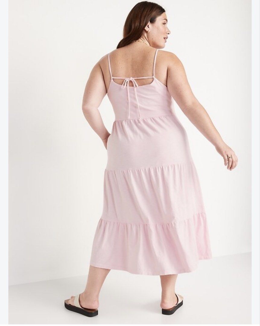 Old Navy Peach tiered midi sundress (Category: Dresses) located in Antipolo. Submitted by harlowwillow (Listing ID 1469773685, Image 1). Description: NO TO LOW BALLERS L on tag upto XL - Color: peachy pink - Style: Midi sundress with a relaxed, flowy fit - Neckline & Straps: Scoop neckline with thin adjustable straps - Details: Upper back tie detail and practical side pockets - Skirt: Tiered styling, length hits around mid-calf - Material: Soft a