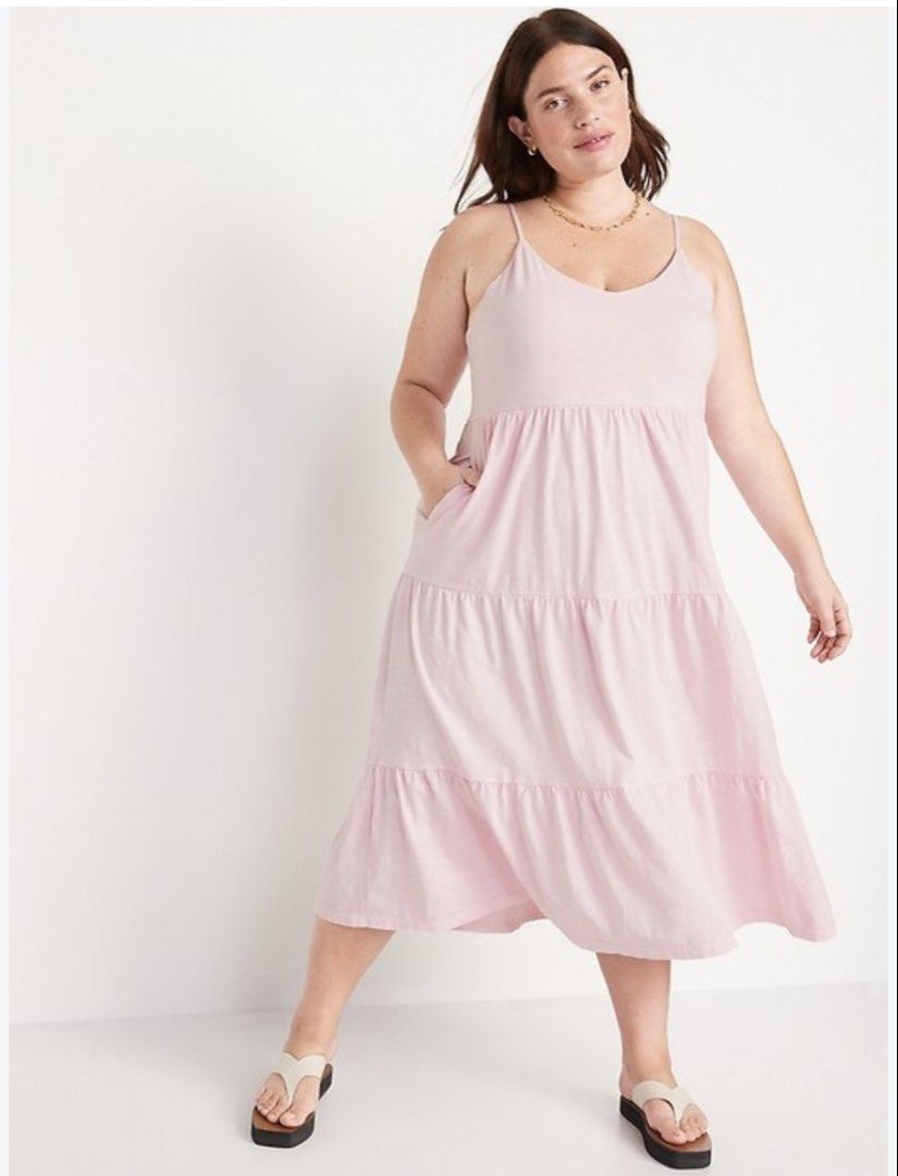 Old Navy Peach tiered midi sundress (Category: Dresses) located in Antipolo. Submitted by harlowwillow (Listing ID 1469773685, Image 2). Description: NO TO LOW BALLERS L on tag upto XL - Color: peachy pink - Style: Midi sundress with a relaxed, flowy fit - Neckline & Straps: Scoop neckline with thin adjustable straps - Details: Upper back tie detail and practical side pockets - Skirt: Tiered styling, length hits around mid-calf - Material: Soft a