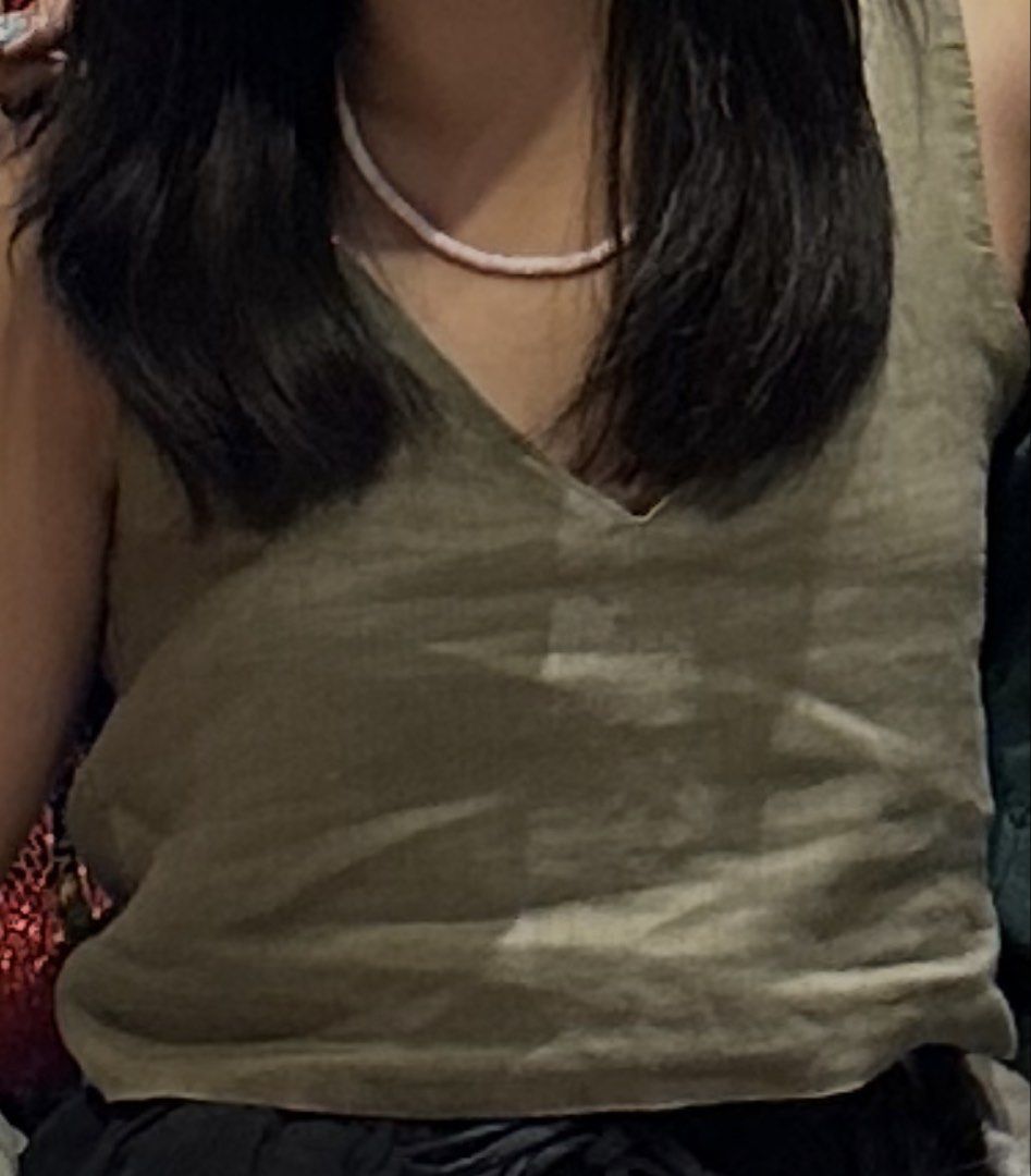 Olive Green V-Neck Linen Top (Category: Sleeveless) located in Paranaque City. Submitted by trendyclothesco (Listing ID 1469841360, Image 2). Description: - Color: Olive green - Style: Sleeveless crop top with deep V-neckline (front and back) - Material: linen-blend fabric - only used 3-4 times .